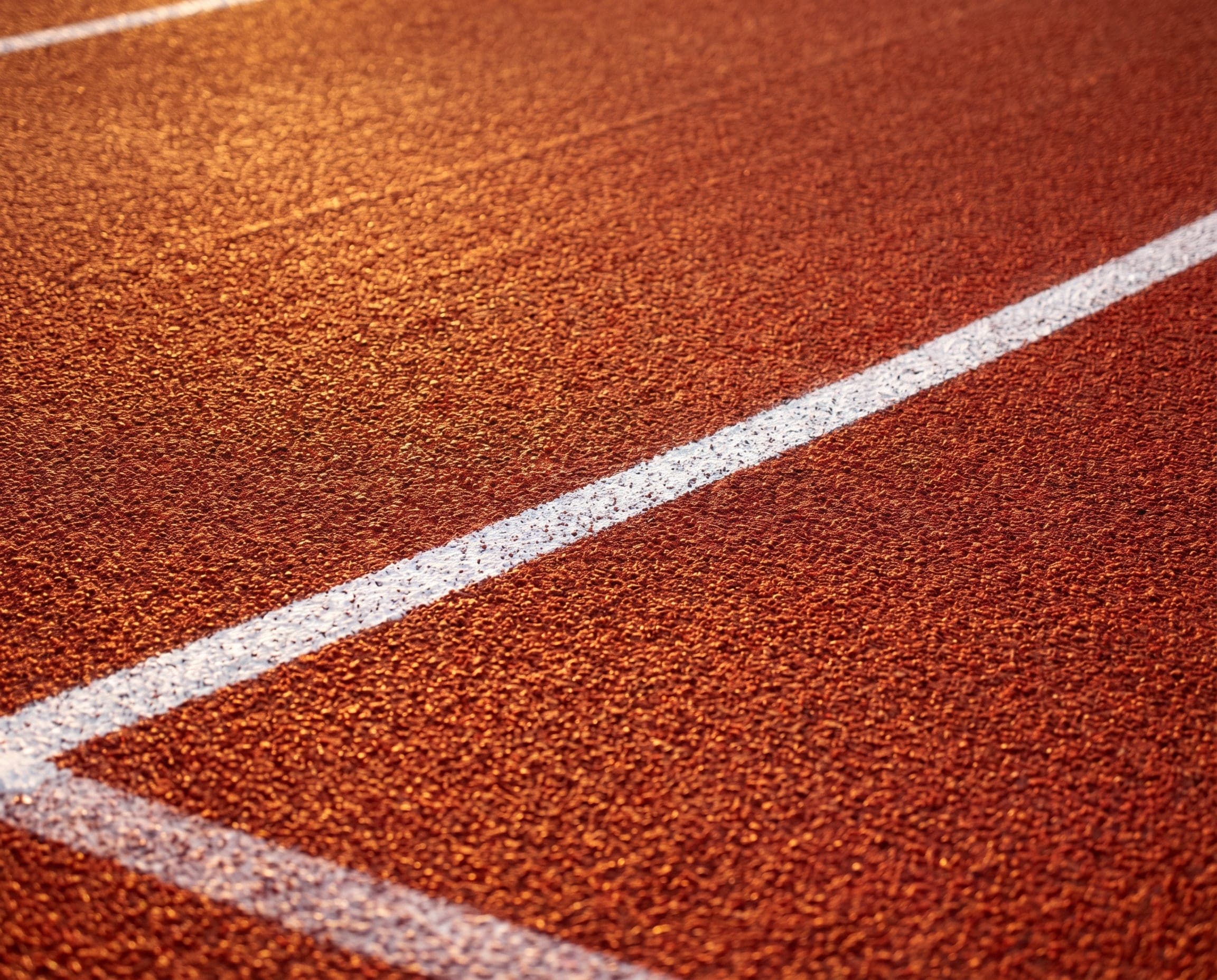 IAAF-certified EPDM rubber running track surface installed by Ayana Trading & Contracting in Qatar.
