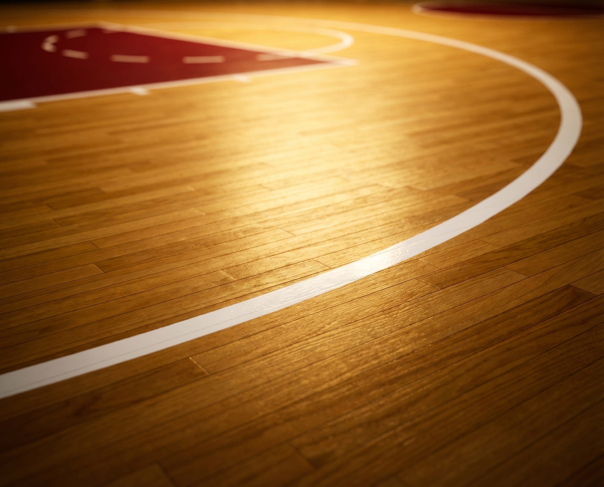 DIN 18032-2 certified maple hardwood basketball court surface installed by Ayana in Qatar.